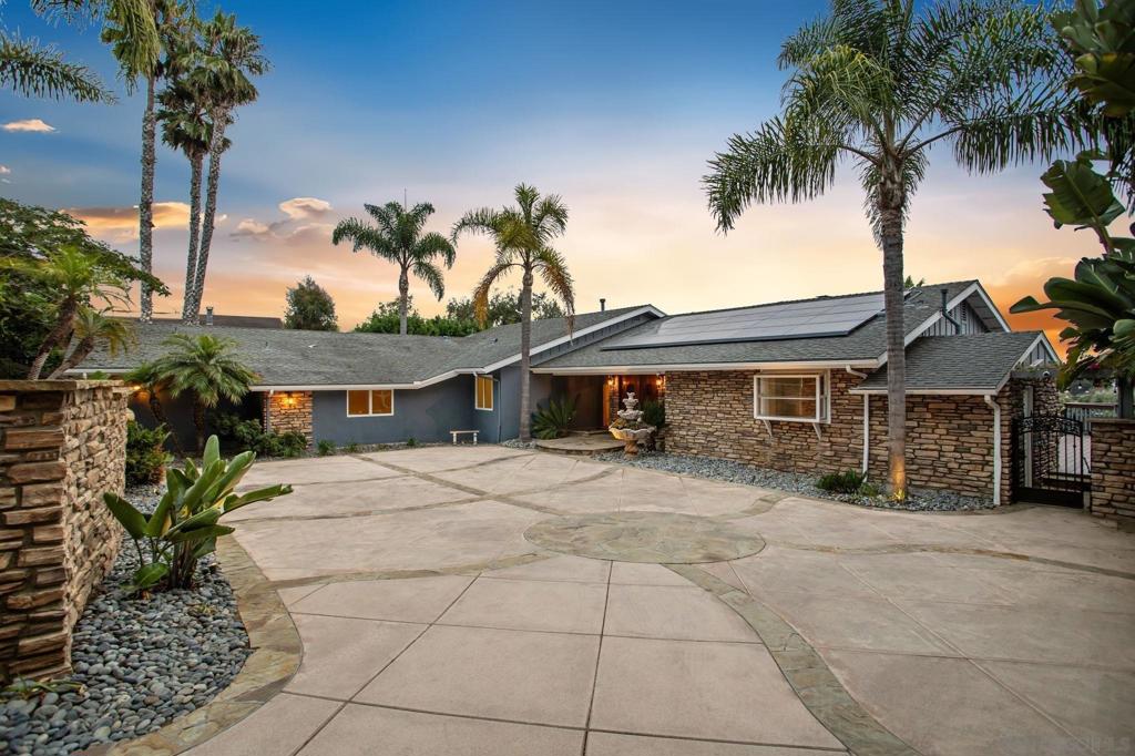 Discover the best of Southern California living in this beautiful gated single-story home, nestled on one of Olde Carlsbad’s most desirable streets! Positioned on a private lot with partial ocean views, this residence blends timeless charm with modern upgrades. Step into a stunning, brand-new gourmet kitchen with premium finishes and an open layout that flows seamlessly into the living spaces. A striking double-sided stacked stone fireplace anchors the home, while wrap-around decks and expansive outdoor areas invite year-round al fresco enjoyment and capture the cool coastal breezes. The resort-style backyard oasis is an entertainer’s dream—complete with a sparkling pool and spa, built-in BBQ, fire pit, and a stylish cabana shower with an outdoor bathroom. Enjoy California’s indoor/outdoor living at its finest! A dry sauna adds a luxurious touch of relaxation. Two spacious bedrooms with a private entrance offers flexible options for guests, or multi-generational living. Energy-efficient solar enhances the home’s long-term sustainability, while a long gated driveway provides both security and convenience. Located just minutes from award-winning schools, beautiful beaches, shopping, dining, and quick access to Interstate 5, this home offers the perfect blend of lifestyle and comfort!