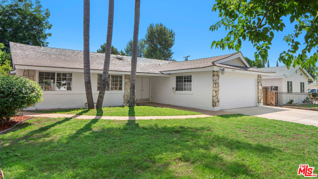 Turn-Key Ranch with Classic Charm and Outdoor Living. Welcome to this refreshed 4-bedroom, 2-bath single-story Ranch-style home in the desirable North Hills neighborhood. Recent updates include fresh interior and exterior paint and new bedroom flooring, giving the home a clean, inviting feel. The bright, functional layout offers comfortable living spaces and sunlit bedrooms. The spacious backyard features a built-in outdoor fireplace and with a built-in BBQ perfect for dining al fresco, entertaining guests, or enjoying cozy evenings under the stars. An attached 2-car garage, wide front yard with mature trees, and timeless curb appeal complete the picture. Ideally located with convenient access to everything the Valley has to offer, this is a welcoming home ready for you to enjoy.