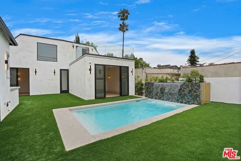 Photo of 1161 Stearns Drive, Los Angeles, CA 90035 (MLS # 25560687) Photo of 1161 Stearns Drive, Los Angeles, CA 90035 (MLS # 25560687)