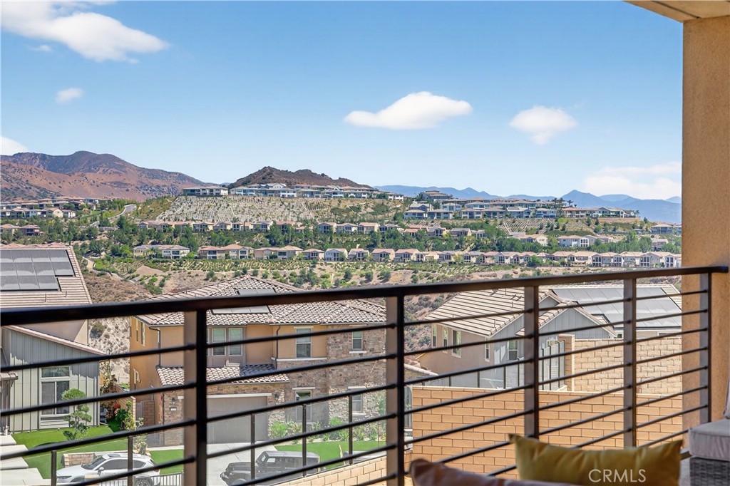 View! View! View! Welcome to your brand new home in the prestigious Skyline at Deerlake Ranch! This is the community’s most popular Plan 1 layout, offering 4 bedrooms, 4.5 bathrooms, and over 3,200 sqft of modern living space designed for today’s lifestyle. The open floor plan features a seamless flow into the California Room, perfect for indoor-outdoor living. The chef’s kitchen is a showstopper with a Sub-Zero refrigerator, 6-burner stove, an executive oversized island, and designer finishes. A guest suite with a full bath downstairs makes hosting family and friends effortless. Upstairs, enjoy a spacious loft, the owner’s suite with retreat area, two walk-in closets, and a private covered deck with breathtaking mountain views. Each secondary bedroom includes its own bathroom. There’s also an extra powder bath upstairs for guests. Sitting on one of the largest and most private lots in the community, this backyard showcases unobstructed mountain views, making it perfect for entertaining or relaxing. As a resident of Skyline at Deerlake Ranch, you’ll also enjoy access to exclusive amenities, including a resort-style pool with spectacular city and mountain views. Minutes away from Porter Ranch town center and private school. Don’t miss this rare opportunity to own a brand new luxury home on a premium view lot!