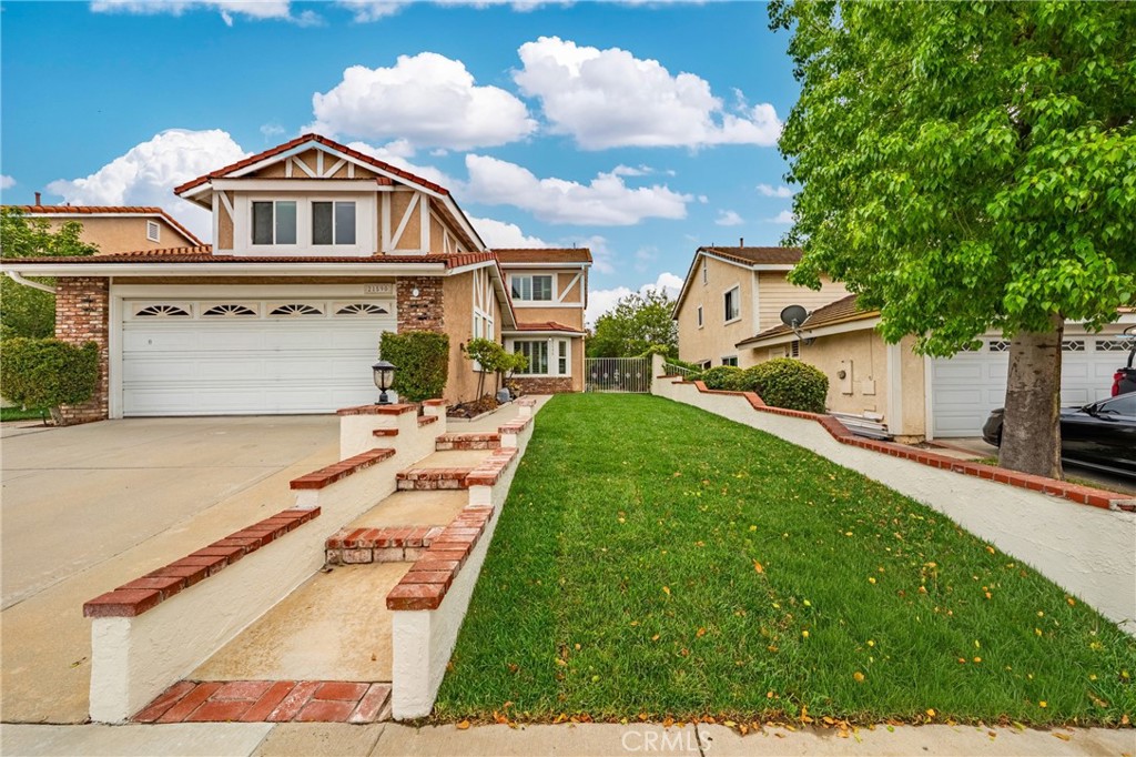 Wonderful Single Family Residence in gorgeous East Lake Village in Yorba Linda.
This 3 bedroom 2 1/2 bathroom home offers 2,183 square foot of living space with beautiful upgrades and amenities including: a gorgeous kitchen with quartz counter tops, crown molding, stainless steel sink and appliances, and large windows for added light from the backyard; family room with brick fireplace; dining room with ceiling fan; large living room; inside laundry; spacious primary bedroom suite with awesome hills views and both walk-in and mirrored wardrobe closets, and two ceiling fans; primary bathroom with dual sinks and recessed lighting; large secondary bedrooms with ceiling fans. The nice house also have newer carpet, newer paint, double pane vinyl windows, plantation shutters, crown molding, hardwood floors, wainscoting, and 2 car attached garage. The inviting backyard is a dream space with multiple fruit trees and hill views. For kids, newer grass will be their fun space.
The house is centrally located in the center of Yorba Linda.Just minutes away from Yorba Linda High School, restaurants, Trader Joe's...... Award-winning school district and peaceful East Lake neighborhood.