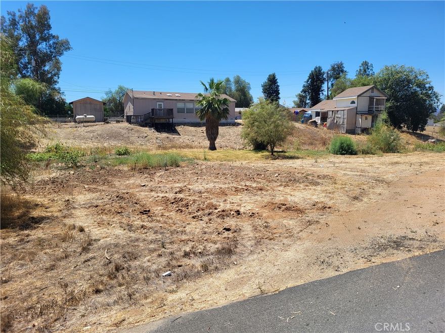 Flat lot. Surrounding by houses; Great for owner use. Check with the city for planning; The Lot located across from 23722 La Bertha Ln.
