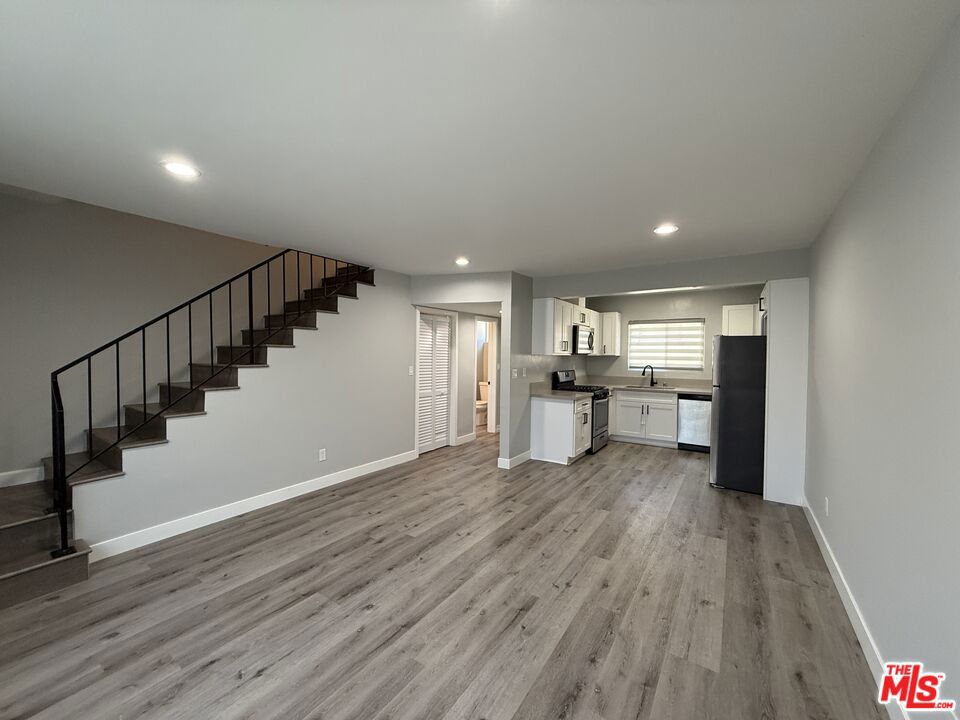 Well maintained 2-level two-bedroom / one-bathroom unit with newer appliance. Very bright and spacious unit which is ready for move in. The asking price includes an additional parking fee of $100 per month.
