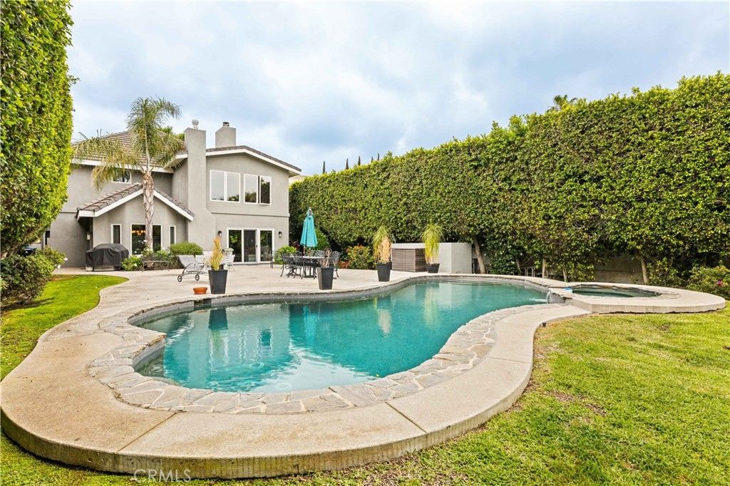 Photo of 4960 Densmore Avenue, Encino, CA 91436 (MLS # SR25109945)