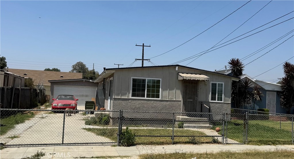 Nice 4 Bedroom 2 Bath,extra long driveway, Two car detached Garage,updated windows,newer floors and roof. bathroom in main bedroom.large yard and many extras. located near major freeways,public tranportation,schools,shopping and recreations facilities.