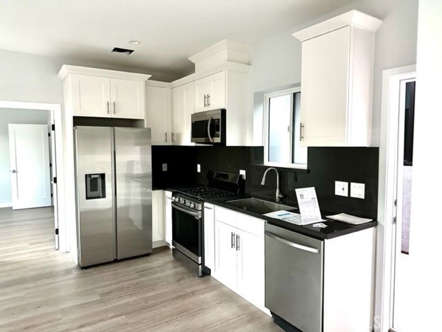 Complete Remodel in 2023!
Move-in ready upstairs 2-bedroom, 2-bath apartment/ADU on Ventura Blvd. This spacious approx. 800 sq. ft. home features newer finishes from floor to ceiling. Enjoy Samsung stainless steel appliances, including a built-in microwave, dishwasher, double-door refrigerator, and gas stovetop.
Each bedroom has its own private bath. The light and bright space offers an open layout with a pleasing neutral color scheme, wood flooring throughout, newer windows, modern lighting and fixtures, updated counters, and generous closet and cabinet space.
One of only four newer apartments built above quiet retail spaces, the building provides private, convenient rear parking and a shared laundry area, with 24 hour camera surveillance of the common areas and self closing secure gate doors. Work from home, with a Ventura Blvd address. Perfectly positioned on Ventura Blvd, just two doors down from Starbucks. Prime location near the 101 and 405 freeways, shopping, restaurants, parks, and hiking areas.
Owner pays for water; all other utilities are the tenant’s responsibility. Available now, easy to apply!