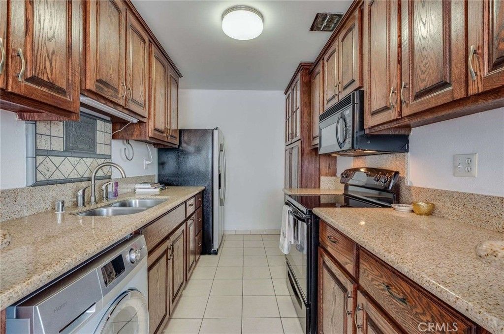 Photo of 5400 Newcastle Avenue #56, Encino, CA 91316 (MLS # SR25198570)