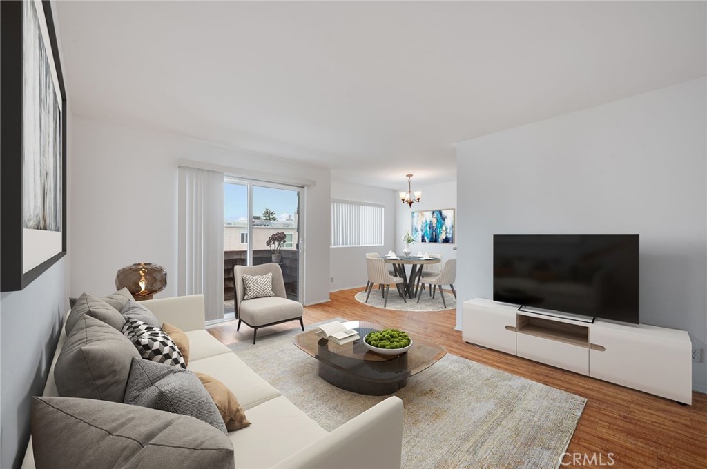 Light & bright 2+2+ DEN! This desirable top floor, corner unit is located in the quiet back of the building and is filled with natural light. It features upgrades such as stone countertops and easy-care laminate and tile floors. The living room opens out to private balcony with a spacious view. Convenience is key with an in-unit combo washer/dryer, walk-in closets, and central AC/heat. In addition to the 2 bedrooms, there is a bonus den area that makes a perfect office, playroom or 3rd bedroom. Well-kept building with a sparkling pool, BBQ area, gym, and rec room. Unit is conveniently located by the elevator with no steps in between. 2 tandem parking spaces and storage lockers included. Moments away from Encino Common's vibrant shops and diverse restaurants, Sepulveda Recreation Area and essential medical and religious centers. Easy access to 101 and 405 freeways. CLOSING COST & DOWN PYMT ASSISTANCE AVAILABLE FOR QUALIFIED BUYERS. Don’t miss!