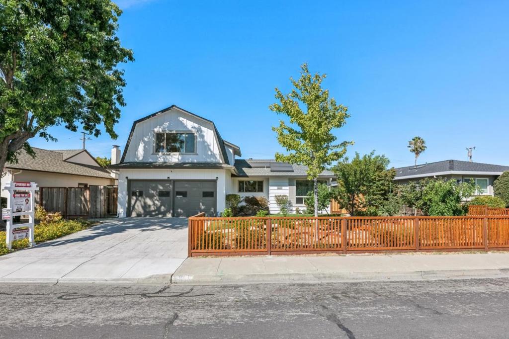 Welcome to this beautifully updated east-facing Santa Clara home with a permitted 1.5 bed / 1 bath ADU (built in 2022) featuring its own separate addressperfect for multi-generational living, rental income, or guests. The main residence offers a fully remodeled kitchen with stainless steel appliances, quartz counters, and a stylish hex-tile backsplash. A porcelain fireplace wall anchors the living room, while three new bathrooms, updated flooring, and fresh paint inside and out make it truly move-in ready. Enjoy a spacious 2-car garage and two private yard areas for entertaining or relaxation. Conveniently located near freeways, Google and Apple, Kaiser, parks, Valley Fair, and Santana Row. Offered fully furnished with curated designer pieces and over $200K in upgradesincluding a new roof and paid-off solar. Best of all, a portion of the sale supports life-saving efforts worldwide through International Crisis Aid Inc.