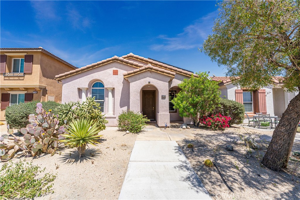 INCLUDES FULLY PAID SOLAR (SAVINGS OF $450+/MONTH). Discover the best value in Verano with this stunning 3-bedroom, 3-bathroom home! Move-in ready with fresh interior paint, this former model home, elegant crown molding and updated flooring that is completely carpet-free. The remodeled primary bathroom features a spacious walk-in shower, while ADA-compliant toilets add convenience in both the primary and guest baths. Enjoy outdoor living with a new patio cover and a generously sized patio area. The open-concept kitchen and family room include a center island and stainless steel appliances. Verano offers exceptional amenities, including a clubhouse, community pool, spa, pickleball and tennis courts, a park, greenbelt, and playground. Conveniently located near shopping centers, just five miles from Palm Springs International Airport, and with easy access to the I-10 freeway. Don't miss this incredible opportunity!