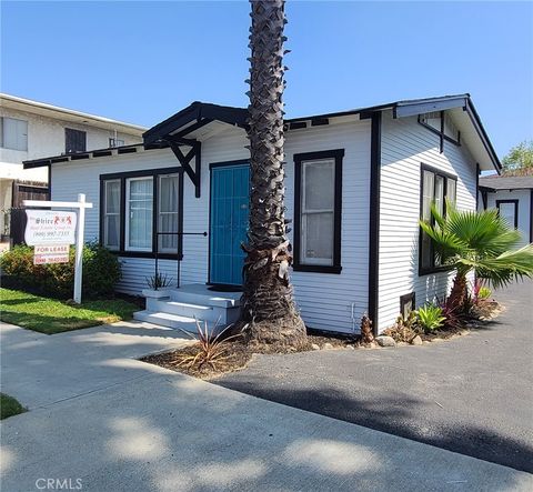 Photo of 1848 Temple Avenue, Signal Hill, CA 90755 (MLS # PW26078860)