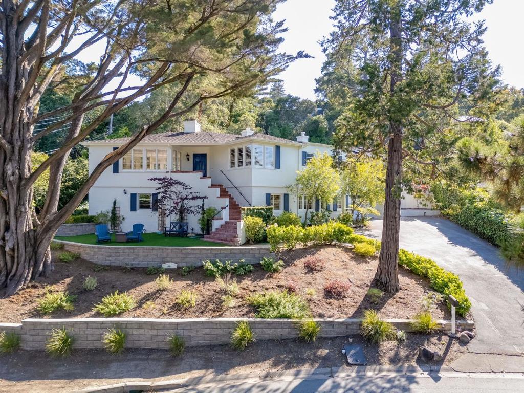A rare find in prestigious Lower Hillsborough, this updated 4BD/3.5BA home offers luxury living, a resort-style backyard with heated pool, and a prime location on a quiet, tree-lined street just minutes from Downtown Burlingame. Thoughtfully designed for modern comfort and timeless style, it features a light-filled living room with fireplace and French doors for seamless indoor-outdoor flow, a formal dining room, and a chefs kitchen with quartz countertops, center island, stainless steel appliances, and custom brick backsplash. The expansive primary suite is a true retreat with soaring ceilings, a private study, spa-like bath with soaking tub, frameless glass shower, and a walk-in closet with custom built-ins. The lower level includes a guest suite/home office, large media or fitness room, laundry room, childrens playroom, and a mudroom with garage access. Set on beautifully terraced grounds with lush landscaping and winding garden paths, this private oasis is perfect for entertaining or quiet relaxation. The sparkling heated pool offers a magnificent view from the water, creating a truly tranquil escape. Walkable to Burlingame Ave, close to top-rated schools and SFOthis exceptional property offers a rare blend of elegance, privacy, and convenience.