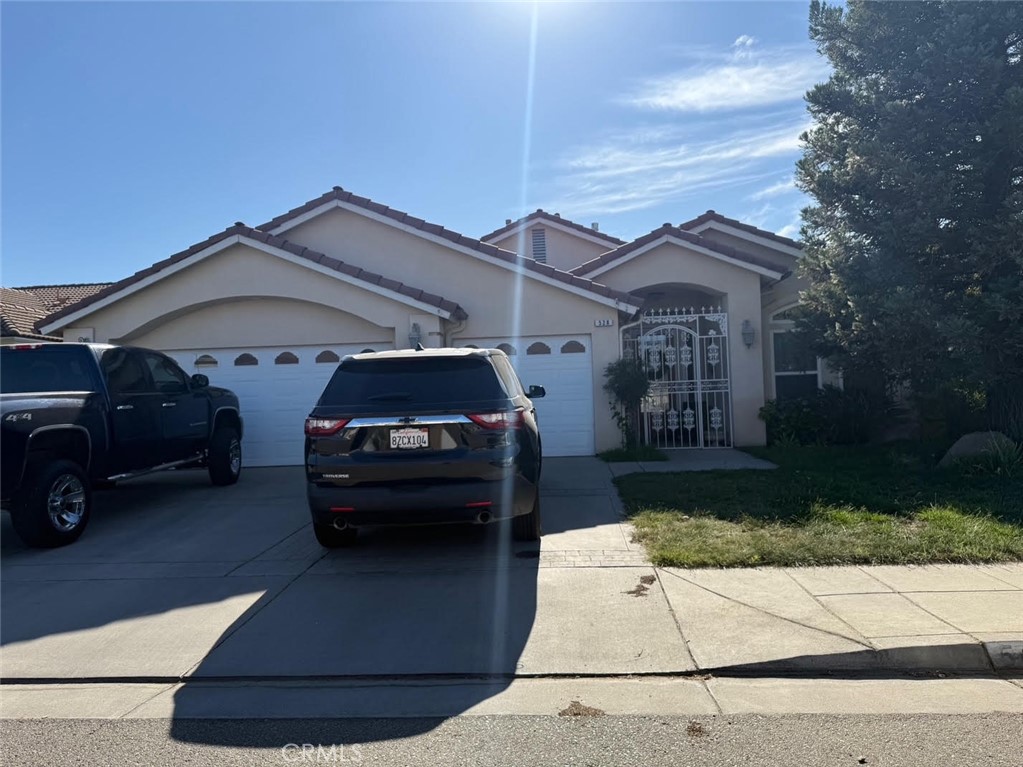 Welcome to 528 Fair Oak Avenue in Madera. This well-maintained Berry-built home offers a blend of comfort, functionality, and thoughtful updates. Located near schools and set toward the back of the subdivision, this 3-bedroom, 2-bathroom home features high ceilings, newer flooring, and abundant natural light throughout.
The kitchen includes granite tile countertops and opens to a spacious living area, ideal for both daily living and entertaining. The primary bedroom offers a large closet, soaking tub, and plenty of lighting.
Enjoy the outdoors with a covered patio, mature landscaping, and a roomy shed for yard tools or additional storage. The finished 3-car garage provides ample space for vehicles, hobbies, or storage needs.
Schedule your private showing today and see what makes this property a standout.