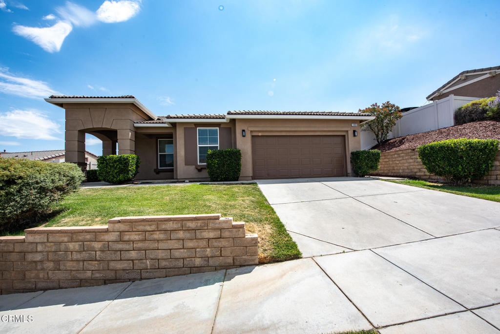 Welcome to this beautifully updated 3-bedroom, 2-bath home in charming Tehachapi. Freshly painted inside and out, this spacious residence offers an open floor plan that makes entertaining a breeze. You'll love the warm, natural light that fills each room, creating a bright and inviting atmosphere.The generously sized kitchen features attractive granite countertops, modern appliances, and easy access to the backyard. Step outside to enjoy a private retreat filled with mature trees, colorful rose bushes, and a welcoming patio--perfect for relaxing or entertaining.Whether you're looking for a full-time residence or a peaceful vacation home, this property offers comfort, style, and plenty of space to make it your own.