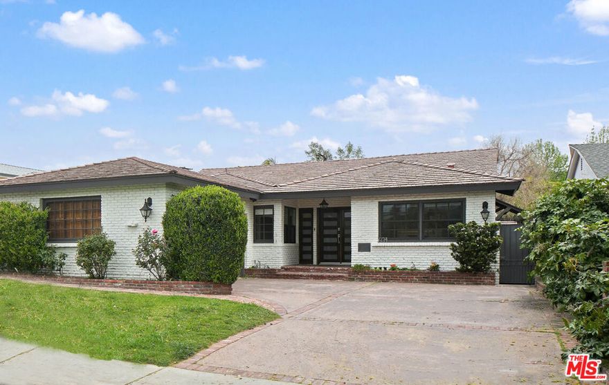 Introducing a lovely 3BD/3BA home situated on a large lot in a great pocket of Valley Glen. This single-story home features an open floor plan with natural light pouring throughout. The eat-in kitchen has been updated with plenty of cabinetry and prep space, stainless steel appliances and wine fridge. The formal living room offers a fireplace, built-ins, direct access to the backyard and opens to a family room with fireplace and double doors leading out back. The main suite is spacious with a walk-in closet and spa-like bath complete with dual vanities and shower. The other 2 bedrooms are spacious, each with plenty of storage. The entertainer's backyard has a pool, grassy area and covered patio, perfect for dining al-fresco. Located moments to Valley Glen Park and easy access to studios and freeways, welcome!