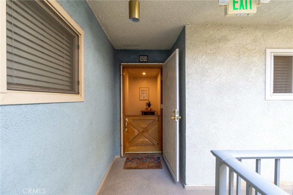 Photo of 3707 E Livingston Dr #303, Long Beach, CA 90803 (MLS # CV26010300)