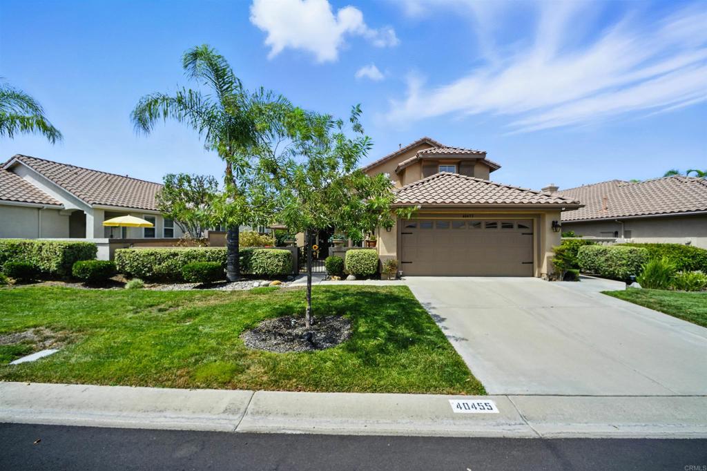 Absolutely beautiful home located in The Colony, Murrieta's premier 55+ community. You'll love the expansive entry courtyard that features an impressive fountain as well as beautifully landscaped front and side yards. Enjoy first floor living at it’s best, primary bedroom suite with large bathroom and spacious walk in closet. Bedroom opens up to the covered patio garden with fountain that overlooks the panoramic grassy greenbelt. Living, Dining, Family, Eat-In Kitchen, plus half bath. Kitchen features stainless steel appliances, large center island, walk in pantry and cozy kitchen nook with window seating. Formal living and dining room with an elegant staircase that leads to loft and guest room private retreat. In door laundry room and roomy 2 car garage with plenty places for storage. Colony has guard gate with 24 hour security, golf course on the property, Clubhouse has resort style amenities, tennis courts, pool and spa. HOA waters & maintains front yards.