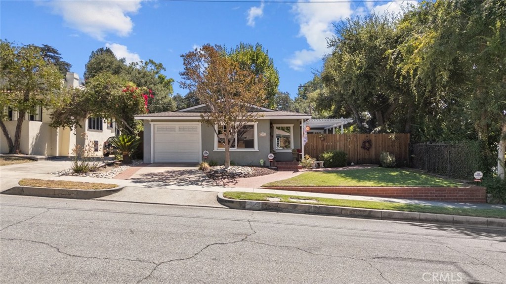 Nestled in the sought after North Monrovia neighborhood just above Foothill and north of Greystone this 2 bedroom 1.5 bathroom home offers charm privacy and convenience. Professionally landscaped grounds enhance the exterior appeal and a welcoming interior features newer double pane windows and a newer roof for both style and peace of mind.
The custom bathroom is finished with travertine stone floors creating a spa like retreat. The living area opens through French doors to a large brick patio perfect for entertaining or enjoying quiet evenings outdoors.
An oversized bonus room buyer to verify permits provides versatile space for a media room home gym or creative studio. A walk in pantry with washer and dryer hookups adds functionality while an additional office or second bonus room offers flexibility for work or hobbies.
A detached studio on the property creates a peaceful retreat for art projects or personal use. The backyard includes a grassy area ideal for pets or play blending beauty with practicality.
Located just minutes from Myrtle Avenue with its variety of restaurants and shops plus nearby parks City of Hope and USC Keck Hospitals this home offers a unique combination of comfort location and character.