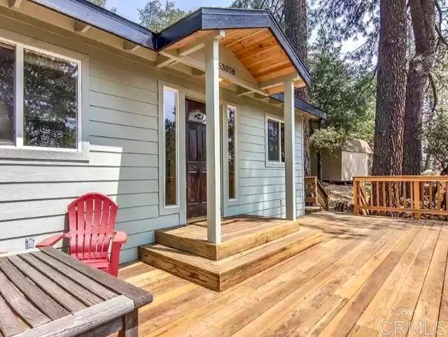 Amazing great starter, little cozy, cabin home for a small family to enjoy the mountain living feel. Turnkey property. Updated years ago. Disregard the year built of 1930. 2 bedroom, 1 bath, laundry room inside. Open floor plan to the kitchen. Recently installed handrail going up to the cabin and also mini-split AC and heater unit for comfort. Large deck area and at night enjoy and have a glass of wine next to the living room fireplace. CHEERS! Enjoy the outside.
