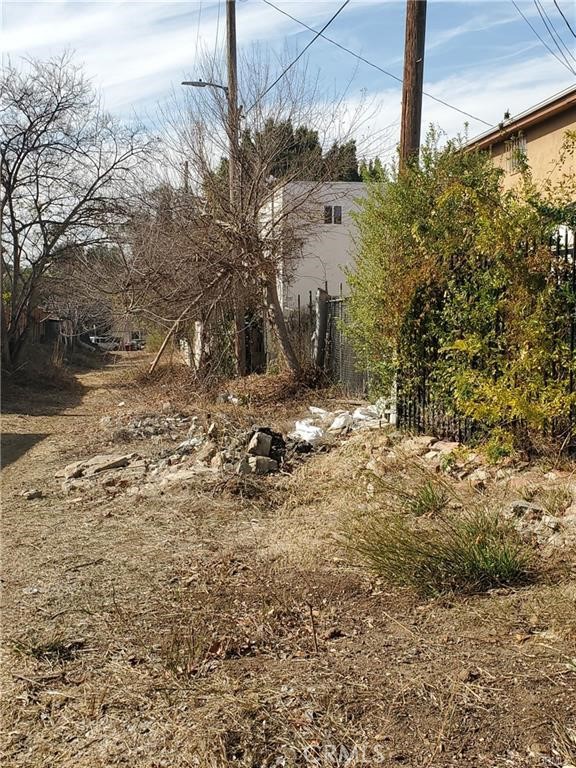 Large Flat lot 7468 sqft reaching Street to Street with 15' wide on Hayes side and 37'wide on S Avenue 60 in the Heart of Highland Park with Adjacent lot 2882 sqft also for sale separately. Together 10,350 sqft of street to street land. Buyer and Agent to consult with City for Allowable use.