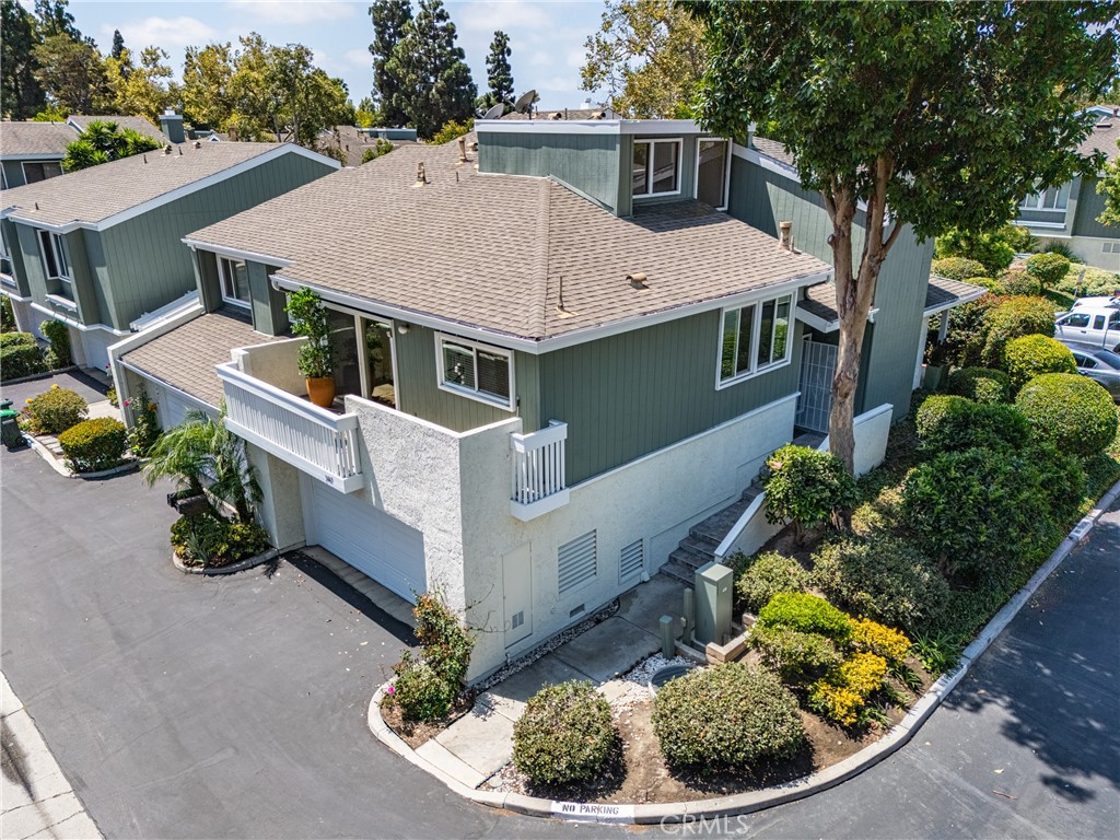 Welcome home to 3447 Meadow Brook in the charming community of Village Creek! This is the one you have been hoping would come to the market! This exceptional corner unit has been remodeled with style and panache with new flooring, lighting, dual-paned windows, updated kitchen, remodeled baths, and fresh paint throughout! Perfectly positioned in an ideal setting on a quiet, inside corner with only one direct neighbor in a picturesque, well-maintained community, this home enjoys optimal orientation, and is mere moments from both guest parking and the easy entrance and exit from the neighborhood. The living areas are generous. A beautiful fireplace & quality built-in's are featured in the living room, in addition to having direct access to the wonderfully private patio. The family room enjoys coastal breezes from the balcony, and is adjacent to the remodeled Tiffany blue kitchen! A host of stainless steel appliances compliment the inspired mosaic backsplash. The elevated bar seating is the perfect venue for your morning coffee or your evening glass of wine. The primary bedroom is located on the main level, and has direct access to the rear patio. The primary bath has been remodeled to perfection. Two generously-sized additional bedrooms, which share a completely remodeled hall bath are found on the upper level. Both enjoy incredible natural light and overlook one of the community green spaces. This home offers the opportunity for you to live in one of the most desirable locations in the entire city, without sacrificing a thing! Even has an oversized two-car garage with an additional work room. Mere moments away from world class shopping at South Coast Plaza, South Coast Village and Crystal Court. Easy freeway access to go anywhere in SoCal!