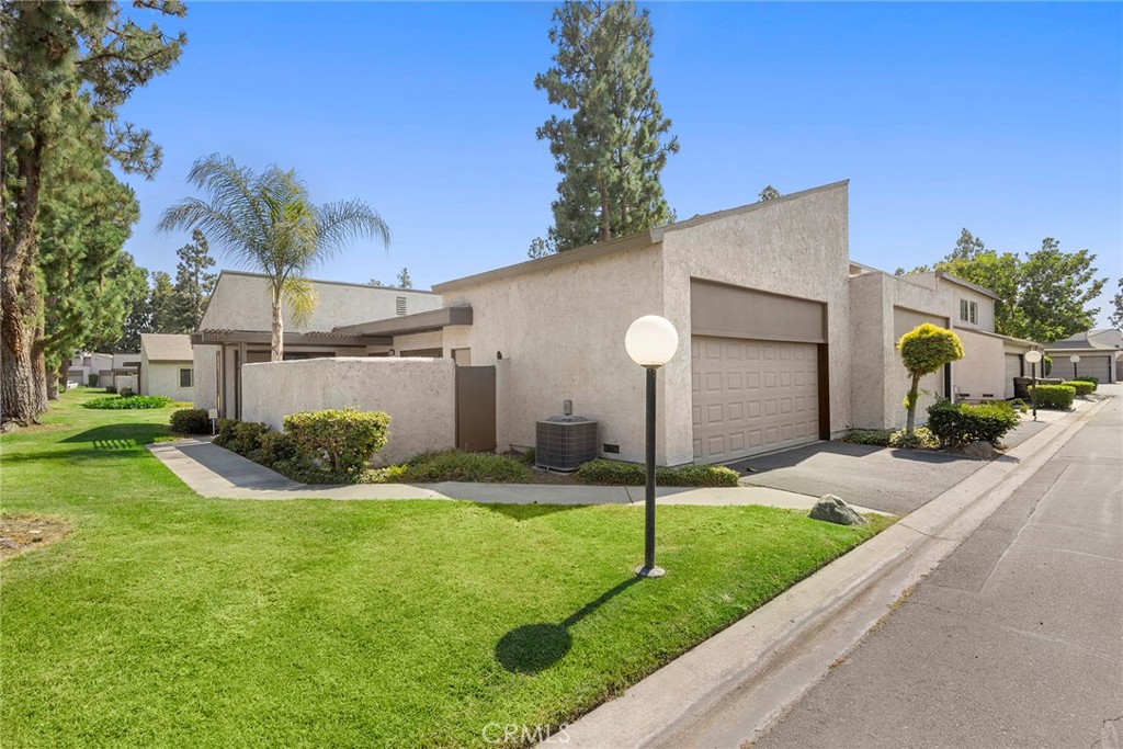 Welcome to this charming 2-bedroom, 1.5-bathroom single-level townhome located in the highly sought-after Villa Frontera community of Anaheim. Offering 943 square feet of comfortable living space, this home combines privacy, convenience, and peaceful community living.
Situated along an expansive grassy greenbelt, the home enjoys a serene setting with two large front-facing windows that fill the living room with natural light and provide lovely views of the open green space. The open-concept living and dining area creates a warm and inviting space to relax or entertain.
The kitchen features a sliding glass door that leads to a private side patio—perfect for enjoying a quiet morning coffee or dining al fresco. The patio is enclosed by a stucco wall, offering a secluded outdoor retreat. The spacious master bedroom also has direct patio access through its own sliding glass door, as well as an ensuite bathroom with a recently renovated walk-in shower.
Additional highlights include a convenient half bath for guests, a large 2-car garage, central location near the community clubhouse with a sparkling pool, relaxing jacuzzi, and meeting area—ideal for gatherings and recreation.
Located within the desirable Placentia-Yorba Linda Unified School District, this home is close to shopping, dining, parks, and major freeways, offering an ideal combination of comfort, community, and commuter-friendly convenience.
Don’t miss this opportunity to own a low-maintenance home in a beautifully maintained neighborhood!