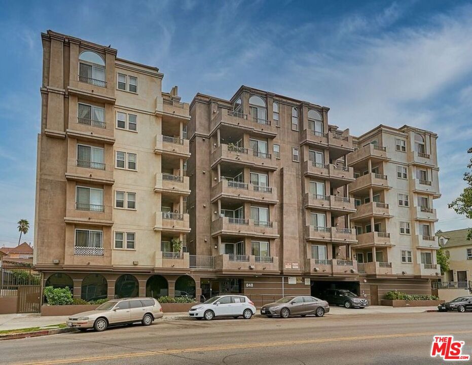 Welcome to Unit 105 at The Juniper, one of the most luxurious and desirable mid-rise condominiums located in the heart of the Mid-Wilshire and Koreatown neighborhoods. This spacious southwest corner unit is filled with natural sunlight and offers a bright, open living room with high ceilings. The expansive primary suite features a large walk-in closet and a private en-suite bathroom. Two additional bedrooms provide generous space, along with a second full bathroom. The home is elegantly appointed with classic hardwood flooring throughout, an in-unit washer and dryer, and a modern kitchen equipped with stainless steel appliances, granite countertops, a breakfast nook, and sleek contemporary cabinetry. Residents enjoy secured and gated garage parking with assigned tandem spaces, as well as ample guest parking. Community amenities include a fitness center, dual elevators, and a recreation room. Ideally located just blocks from Wilshire and Olympic Boulevards, The Juniper offers easy access to public transportation, including the Wilshire/Normandie Metro Station, as well as proximity to banks, restaurants, markets, and entertainment venues. Don't miss this rare opportunity to own in one of the city's most vibrant and convenient neighborhoods. More photos coming soon!