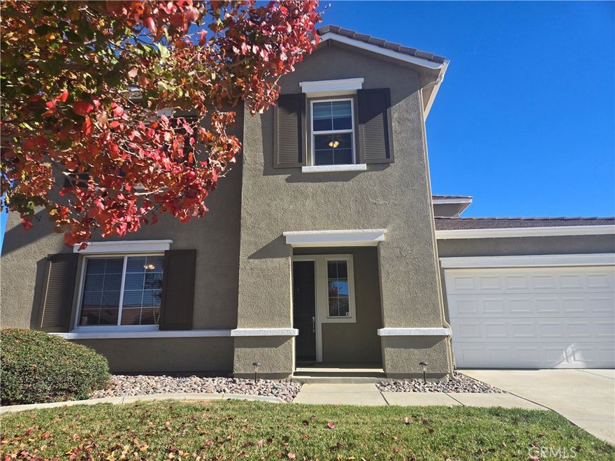 Welcome to beautiful two story home in near by Quartz hill high school. Quiet and nice neighbors area. The spacious living and dining area , one bed room located downstairs is perfect for the guest stay. The granite island kitchen top  with ample cabinetry space is ideal for big family or entertaining. 
Laundry in unit located upstairs with sink for any convenience.  Huge walk in  master's closet and dual vanity.  Covered patio is good for the family or friends gathering. And much more!!