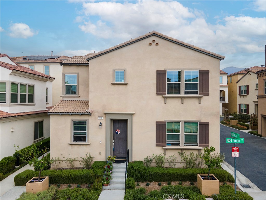 Discover comfortable living in this charming condo located within the gated Harvest community of Upland. This detached two-story home captures stunning mountain views and features a thoughtfully designed open layout with recessed lighting, creating a warm and contemporary feel throughout. The kitchen includes a central island and flows seamlessly into the living area perfect for hosting friends or enjoying everyday life. A convenient main-floor bedroom and bathroom offer flexibility for guests or multi-generational living, while an upstairs loft adds extra space for work or relaxation. The spacious primary suite includes its own ¾ bath, and two additional bedrooms upstairs share a full hallway bathroom. Each of the four bedrooms includes a ceiling fan to help keep cooling costs down in the warmer months. A dedicated upstairs laundry area provides added practicality. The attached 2-car garage offers direct home access and extra storage. Enjoy the resort-like amenities offered by the HOA, including a sparkling pool, spa, a fitness center, BBQ areas, a clubhouse, playgrounds, and community gardens. With quick access to the 210 freeway and close proximity to shopping, parks, schools, and renowned colleges, this location offers both comfort and convenience. Don’t miss your chance to call this beautiful home your own.