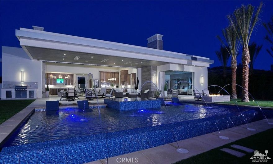 This beautiful newly constructed home with classic modern architecture and simple, elegant lines at the prestigious Madison Club is ready for its new owners! The 6,250 sqft 4 bedroom / 4.5 bath home features an open and inviting floorplan which is perfect for entertaining with genuine hardwood flooring throughout. The spacious kitchen is generously appointed with Viking appliances. Spectacular views of the 14th green of the Tom Fazio Course and the Santa Rosa and Chocolate Mountains invite you to step outside and enjoy the spacious outdoor living area with infinity pool and fire feature. The sunsets are simply stunning! Offered designer furnished.