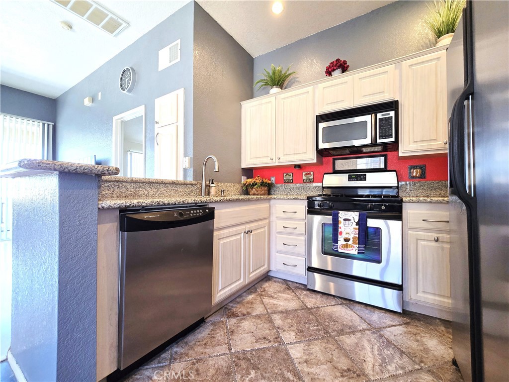 New $20K price reduction! Welcome to this charming and stylish 1 bed, 1 bath top-level end unit condo in the quiet and desirable PALMIA gated community. Built in 1990, this lovely community is well maintained with landscaped grounds featuring multiple palm trees, a sparkling pool, spa, fitness room, club house and plenty of guest parking.
Ascend the stairs to the 3rd level and step inside this urban retreat with no one above you and only one shared side. You will love the blond laminate flooring, custom paint and high ceilings throughout. This inviting condo features an open concept living room with glass sliders leading to a large private balcony equipped with your own side-by side laundry. The dining area adjacent to the kitchen and living room has marble flooring. The updated kitchen has a breakfast bar overlooking the living room, granite countertops, tile flooring and stainless steel appliances. The bedroom suite comes with two large closets and built-in cabinet for ample storage. The full bath is neutral in color with a shower/tub combo and medicine cabinet. There are no carpets in the unit for easy cleaning! This condo is complete with an enclosed, detached one car garage with automatic opener. HOA pays for water, trash, and master insurance for community grounds.
Conveniently located within walking distance of The Lundquist Institute’s Biotech Park at Harbor-UCLA with easy access to shopping, dining, parks, and the 110, 405 and 91 freeways. Approximately 10 min. drive to Del Amo Mall, 20 min drive to Redondo Beach Pier. With everything you have been waiting for, Top End unit with no one above you, 1 car garage with remote, in-unit Laundry, large balcony with own washer and dryer, A/C, low HOA fee, this condo and community are ready for you to move in. This Probate sale is being sold in "as is" condition but has Brand New Air condition and heating with new thermostat installed 8/12/25 and new shower fixtures. It works like a standard sale, no court confirmation is needed. Hurry and Don’t miss this opportunity to call this place your own.