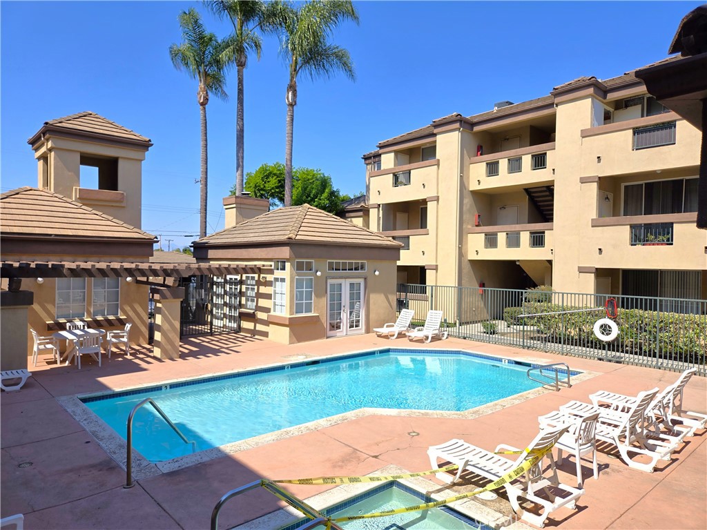 Welcome to this charming and stylish 1 bed, 1 bath top-level end unit condo in the quiet and desirable PALMIA gated community. Built in 1990, this lovely community is well maintained with landscaped grounds featuring multiple palm trees, a sparkling pool, spa, fitness room, club house and plenty of guest parking.
Ascend the stairs to the 3rd level and step inside this urban retreat with no one above you and only one shared side. You will love the blond laminate flooring, custom paint and high ceilings throughout. This inviting condo features an open concept living room with glass sliders leading to a large private balcony equipped with your own side-by side laundry. The dining area adjacent to the kitchen and living room has marble flooring. The updated kitchen has a breakfast bar overlooking the living room, granite countertops, tile flooring and stainless steel appliances. The bedroom suite comes with two large closets and built-in cabinet for ample storage. The full bath is neutral in color with a shower/tub combo and medicine cabinet. There are no carpets in the unit for easy cleaning! This condo is complete with an enclosed, detached one car garage with automatic opener. HOA pays for trash, , master insurance, pool Service and general maintenance for community grounds.
Conveniently located within walking distance of The Lundquist Institute’s Biotech Park at Harbor-UCLA with easy access to shopping, dining, parks, and the 110, 405 and 91 freeways. Approximately 10 min. drive to Del Amo Mall, 20 min drive to Redondo Beach Pier. With everything you have been waiting for, this condo and community are ready for you to move in and enjoy for years to come. Don’t miss this opportunity to call this place your home!