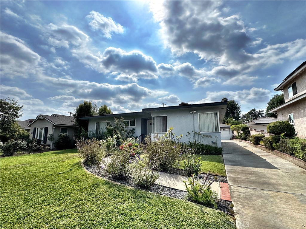 Experience elegant living at 6825 Rockhold Ave, San Gabriel. Built in 1952, this beautifully maintained 3-bedroom, 2-bath home offers 1,509 sq. ft. of comfort in a sought-after neighborhood with top-rated schools. Enjoy a spacious living room that flows to a formal dining area, plus a well-appointed kitchen with granite counters, ample cabinetry, recessed lighting, stainless steel appliances, and a built-in microwave. A generous den with a cozy gas fireplace, ideal as a 3rd bedroom, opens through French doors to the backyard. The bedrooms are roomy and inviting, while the updated bath boasts a stylish walk-in shower and modern vanity. Additional highlights include central A/C, ceiling fans, a large 2-car detached garage, and a covered patio overlooking the park-like yard, perfect for relaxing or entertaining. Move-in ready and full of charm, this home is an opportunity you won’t want to miss!