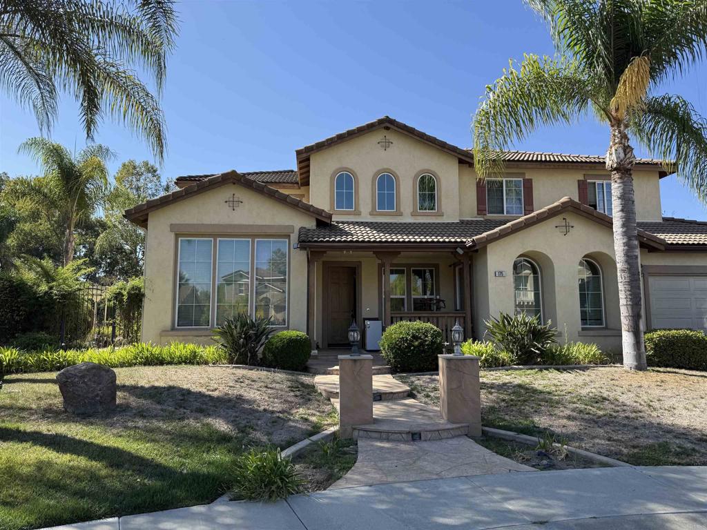 4BR/3.5BA home in the gated Brookside community of Escondido! Located at the end of the cul-de-sac on Double Eagle Glen, a private street with its own gate. Spacious 3,145 sq ft floor plan on a large 13,084 sq ft lot. Features include a downstairs bedroom with full bath, large kitchen with center island, family and living rooms, office/bonus room, and upstairs loft. Backyard is perfect for entertaining with flagstone hardscape, outdoor kitchen with grill and sink, fire pit, and fruit and palm trees. Front yard has lighted flagstone pillars and walkway. Laundry room downstairs with sink and cabinets. Washer, dryer, refrigerator, and furniture included. Home needs some repairs and new carpet—great opportunity to customize in a sought-after neighborhood!