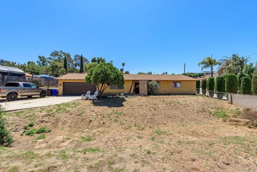 Welcome to your move in ready home in Encanto! This move in ready three-bedroom, two full-bathroom detached home has so much to offer and lots of potential including the ability to build an ADU on the huge 1/2 acre lot.  This home features a galley kitchen with plenty of closet and counter space and large pantry. The spacious living room currently used as a game room can be converted to a huge formal dining room, or even opened up to the family room to create a great room.  Each bedroom offers generous space and walk in closets. Situated on a quiet street in a peaceful neighborhood, this home is just minutes away from MLK Park & Community Swimming Pool, major San Diego highways, local schools, and shopping. Don't miss out on this priced to sell, move-in-ready gem!