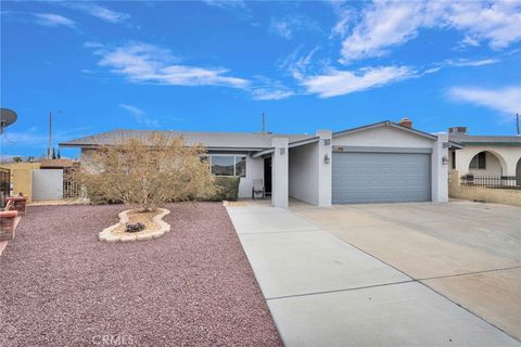 Photo of 936 Pinon Dr, Barstow, CA 92311 (MLS # HD26024693)