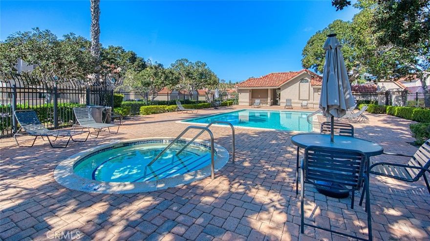 Step into this spacious and beautifully updated 2-bedroom, 2-bath condo tucked away in a quiet, private part of the community. As soon as you walk in, you're greeted with stunning views of the Saddleback Mountains and rolling green hills—your own peaceful retreat.  To the left, you’ll find a freshly painted, thoughtfully redesigned kitchen that flows effortlessly into the open dining and living areas. With its stylish grey tones, granite countertops, custom cabinets, upgraded stovetop hood, stainless steel appliances, and elegant fixtures, this kitchen is as functional as it is beautiful.  Hosting friends or simply enjoy a quiet evening is easy with the generous, partially covered patio that offers plenty of space to relax or entertain—indoors and out.  Your primary suite includes dual sinks and plenty of space to unwind, while the second bedroom features a charming French door leading straight out to the patio. Throughout the home, you’ll love the mix of hardwood and tile flooring, mirrored closet doors, updated copper plumbing, and Central A/C for those warmer days. There’s also tons of storage both inside the unit and in the garage.  It’s just a short stroll to the community center, pool, and spa, with quick access to local shopping and freeways—making life just that much easier.