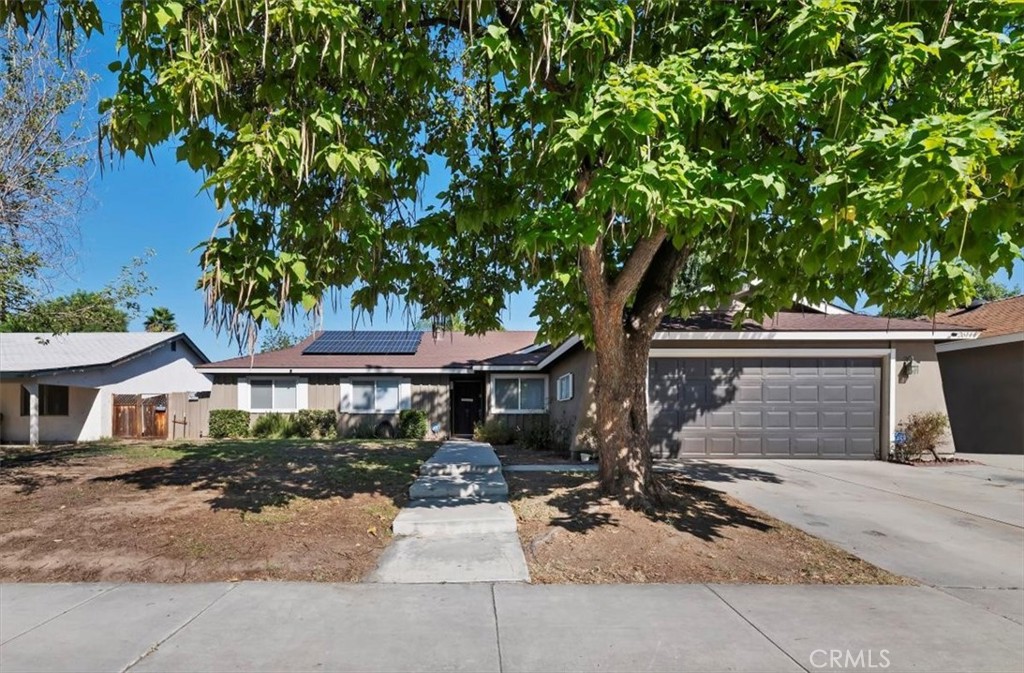 Welcome to this move-in ready Hemet home, where comfort, style, and versatility come together. Featuring 3 bedrooms, 2 bathrooms, and a flexible floor plan with the potential for a fourth bedroom, this home offers plenty of space to grow with your family or create the perfect home office or guest suite. With 1,646 sq. ft. of thoughtfully designed living space on a generous 7,405 sq. ft. lot, there’s room for both indoor enjoyment and outdoor living. Step inside to bright, open living areas that radiate warmth and charm. The kitchen boasts ample cabinet space, making organization effortless and meal prep a joy, while solar panels add energy efficiency and peace of mind. Outside, the large backyard is a private oasis, perfect for entertaining, gardening, playtime, or simply unwinding under the open sky. Blending flexibility, modern comforts, and a prime Hemet location, this home is ready to welcome you and your loved ones to a new chapter of effortless living.