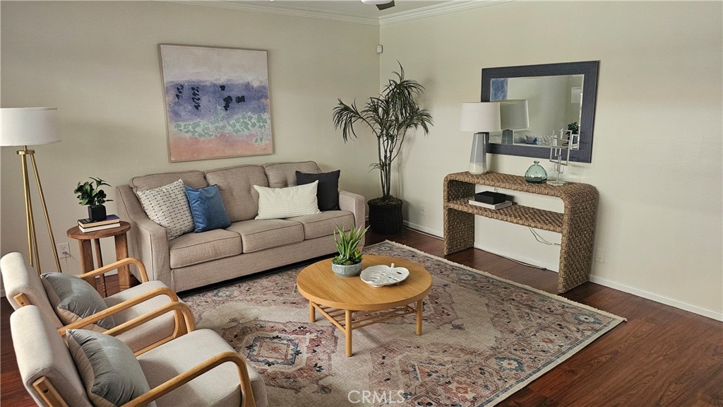 Welcome home to 545 Chestnut Avenue! The combination of this cozy two-bedroom layout with easy access to the beach and local attractions truly offers the best of both worlds. Upgraded vinyl flooring and natural light throughout, this unit leaves little to be desired. The convenience of nearby grocery stores and the proximity to the Long Beach Aquarium and Pier make it an ideal location for those who appreciate both relaxation and adventure. The tranquil community atmosphere adds to the charm, providing a peaceful retreat after enjoying the vibrant offerings of the city. HOA dues cover essential services such as water, trash, sewer, insurance, and grounds maintenance, allowing for stress-free living. The pet-friendly community also offers a designated storage area to help keep your belongings organized. One assigned parking space included.
