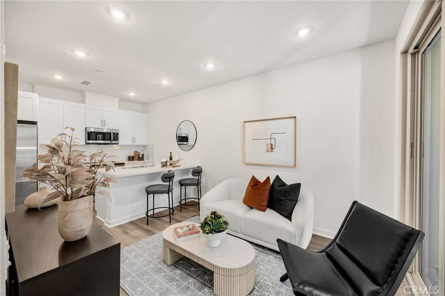 An Ideal First Home in the Heart of Placentia – HUDSON EAST.  If you’ve been waiting for the perfect opportunity to own your first home, this brand-new townhome at HUDSON EAST checks all the boxes. Located in a welcoming, private community of just 39 homes, this thoughtfully designed one-bedroom, one-and-a-half-bath residence offers a smart, low-maintenance lifestyle with modern finishes and energy-efficient features—ideal for first-time buyers.  Inside, you’ll find tall ceilings, a bright open-concept floor plan, and luxury vinyl plank flooring. The modern kitchen is beautifully appointed with white thermofoil cabinetry, quartz countertops, and stainless steel appliances. Additional highlights include abundant storage, dual-pane windows, an electric water heater, and a private one-car garage.  Enjoy an easy transition into homeownership with a move-in-ready design, manageable HOA, and a layout that maximizes space, comfort, and natural light. Best of all, the builder is currently offering special year-end incentives, including interest rate buy-downs, helping make monthly payments more affordable and homeownership more attainable. Perfectly positioned with quick and easy access to the 91, 55, and 57 freeways, this home offers exceptional convenience for commuters. Enjoy nearby Yorba Regional Park, featuring miles of scenic trails, multiple playgrounds, and peaceful ponds for fishing. Just minutes away, explore local attractions such as the Richard Nixon Presidential Library, the new Yorba Linda Town Center with a brand-new Regal movie theater, Bristol Farms, and a wide variety of dining options. Golf enthusiasts will appreciate close proximity to Black Gold Golf Course, offering a driving range, popular bar and grill, and breathtaking hillside views. This opportunity will not last long, so come see these great new townhomes today!