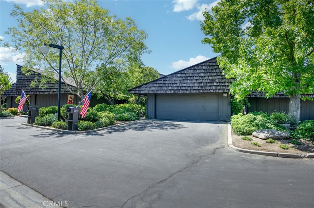 This beautiful 4bd, 3ba home offers 2,231sf on a 4,080sf lot in the desirable Casitas Van Ness community on Van Ness Blvd near Shaw. A gated entry opens to a private courtyard and a versatile bedroom currently used as a home office. The thoughtful layout includes two bedrooms on the main level including the primary suite with updated ensuite and two more bedrooms plus a full bath upstairs. Updates include a new roof (2021), HVAC (2022), new skylights, upgraded sliders, new carpet and paint in the primary, and refreshed bath counters and flooring. The main living area is a standout with vaulted ceilings, custom built-ins, and a white brick fireplace, offering an inviting setting for both formal dining and everyday relaxation. Floor-to-ceiling windows and upgraded sliders provide gorgeous natural light and views of the backyard. The spacious kitchen features a center island, casual dining space, and adjacent laundry closet. Remote-controlled shades enhance comfort. As part of the Casitas Van Ness community, residents enjoy access to multiple pools, tennis courts, and a clubhouse. Tucked within this private, park-like neighborhood, the home feels secluded while remaining close to shopping, dining, and everyday conveniences.
