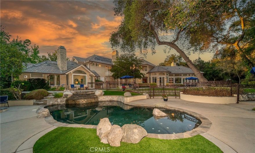 Newly listed Modern Serenity in the De Luz Hills



Welcome to your private escape in the rolling hills of De Luz—just 9 minutes from town, yet a world away. Set on over 5 acres of lush, tranquil landscape, this stunning estate seamlessly blends natural beauty with modern luxury.



The centerpiece is a recently refreshed and transformed striking 6,000 sq ft home with 5 spacious bedrooms, 5 1/2 bathrooms, thoughtfully designed for open-concept living and effortless indoor-outdoor flow. Winding stone paths lead you across charming bridges and past a gentle stream, all surrounded by lush greenery and curated landscaping that feels like your own private park illuminated by custom designed lamp posts adding to the unique charm of the property.  The grounds also boast more than a dozen citrus, avocado and fig trees ripe for seasonal picking.



Inside, sophistication meets comfort. Soaring vaulted ceilings invite in sunlight, while the chef’s kitchen is fully equipped with premium appliances: built-in refrigerator, 6-burner stove, dual dishwashers, two microwaves, and double ovens. Custom Kitchen features include sleek granite counters.

You will also find plenty of storage, walk in pantry and separate wine room. Enjoy one of the most scenic backyards in De Luz with views of the park-like setting as well as an inviting pool & spa  under the enchanted hundred year old Oak Trees. 



Need extra space? A full upstairs apartment offers the perfect setup for guests, extended family, or even an income opportunity.



And there’s more:



64-panel solar system (paid off)

Three potential water wells,

Professionally landscaped outdoor spaces ideal for entertaining or relaxing.

Ideal location with Old Town Temecula and Temecula Wine Country just minutes away, this one-of-a-kind property offers the ultimate balance of seclusion and convenience.  An absolute must see!