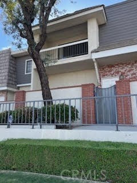Photo of 10201 Mason Avenue #101, Chatsworth, CA 91311 (MLS # SR26069288)