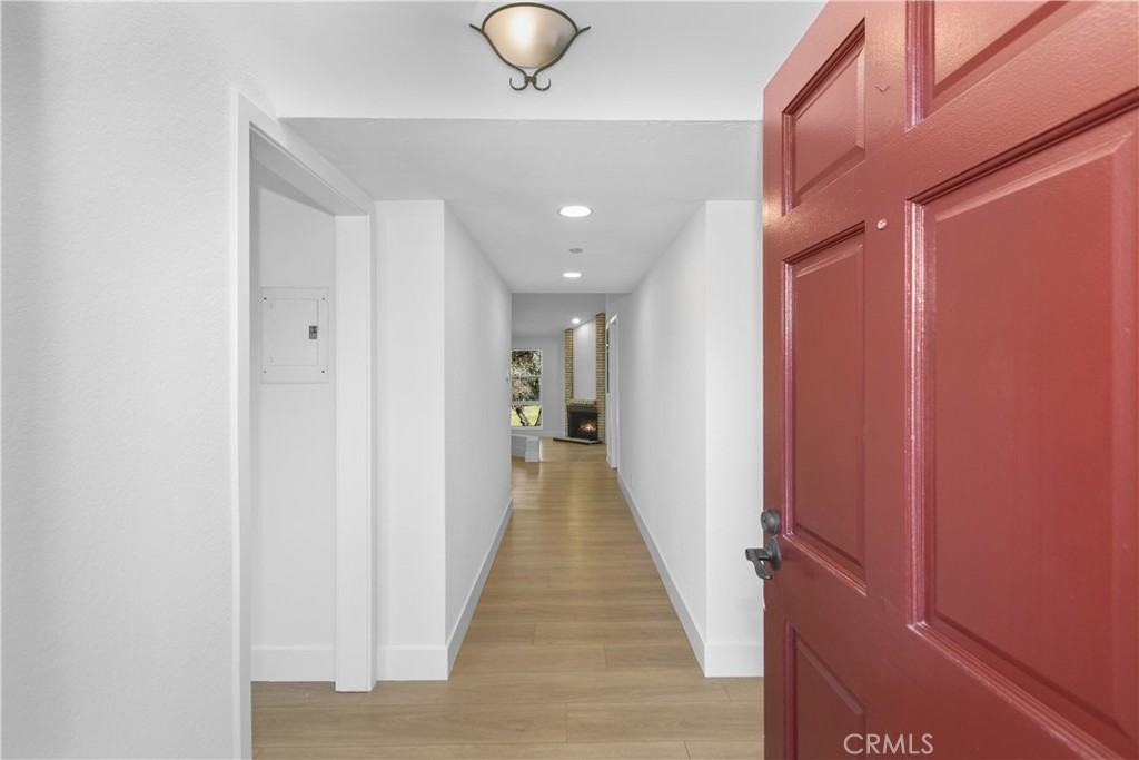Welcome to this beautifully remodeled 3-bedroom, 2-bath condo featuring a versatile loft space, soaring cathedral ceilings, and golf course views. Every inch of this home has been thoughtfully updated, including all-new appliances and modern finishes throughout. Step into an airy open-concept living area, where large windows flood the space with natural light and offer stunning views of the green. A cozy fireplace anchors the living room, seamlessly flowing into a dedicated formal dining area and a charming breakfast nook off the kitchen—perfect for entertaining or everyday living.
The spacious Primary suite includes direct access to the patio, where you can unwind with peaceful golf course views. The remodeled bathrooms and well-appointed kitchen bring both style and function to your daily routine. Additional features include an upper-level entry for added privacy, a single-car garage and a covered parking spot located right outside your front entrance. With a layout that balances space, comfort, and elegance, this home is ideal for those looking to enjoy modern living in a tranquil setting. Don't miss the opportunity to own this turn-key gem!