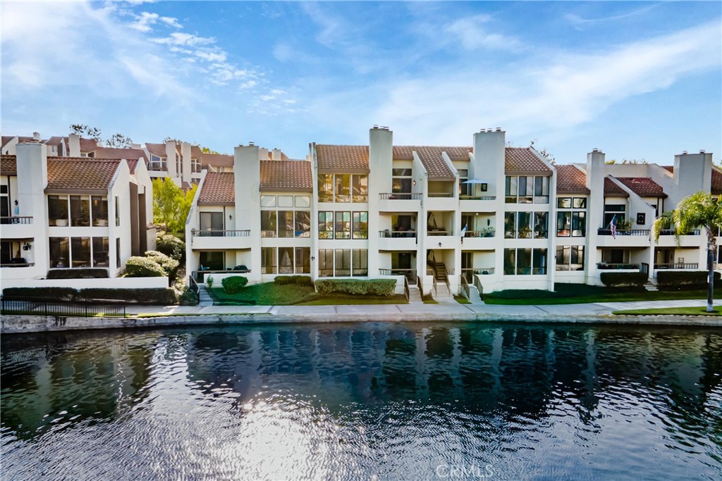 $4,500 per month. Ready for move in now. Long term lease preferred but open to short term. Offered both fully furnished or unfurnished. Lakefront completely remodeled condo with nobody above, vaulted ceilings and open floorplan. Stunning lake, lights, hills and mountain views in an incomparable location close to the best amenities in Mission Viejo. Impeccably maintained and beautifully furnished. Upgrades include stainless steel appliances, exquisite granite counters, wood look floor and luxurious carpet, plantation shutters, primary bath with custom dual sink vanity, walk in shower and barn door, walk in closet, second bedroom is oversized and has a separate remodeled bath with tub/shower. Full size stack washer/dryer. Central air conditioning and heat. Top level 1 floor condo with 2 bedrooms, 2 bathrooms, vaulted ceiling, balcony with stairs directly to the lake front path. 2 parking - one detached garage with remote opener and one assigned covered carport across from garage. Finisterra on the Lake is a gated community on Lake Mission Viejo with a private pool and spa and beach as well as access to all lake amenities. No smokers and no pets.