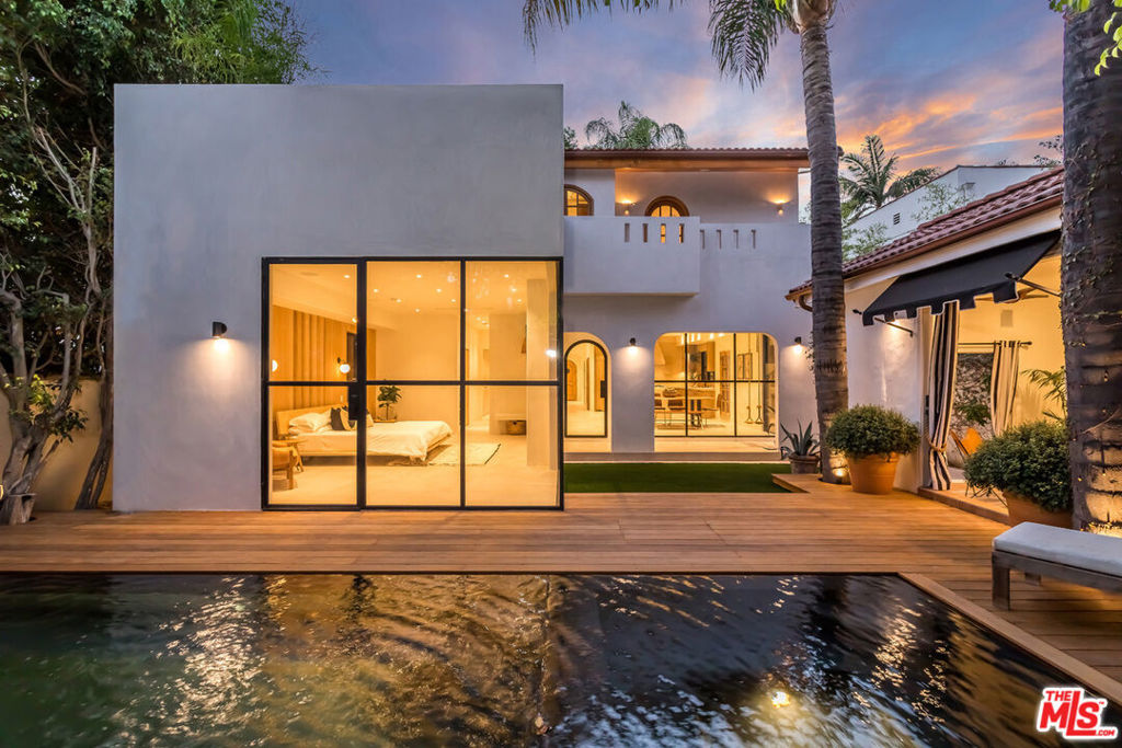 Designer done oasis available for a 24 month fully furnished lease- also available for purchase. An exceptionally curated contemporary Spanish, this is Casa La Jolla. The perfect blend of 1920's classic storybook elevated with today's high standard of comfortable luxury, this breathtaking residence is quite possibly the best Mediterranean setting in all of West Hollywood. An idyllic retreat on one of WeHo's most sought after streets, this rare gem will take your breath away. A private, dreamy resort vibe in the heart of everything LA makes this home both a bespoke work of art and a convenient, lifestyle-centric dwelling. Custom curated by one of LA's most premiere residential Artists, House of Shoor, this rare gem has it all. The expansive main house welcomes you with four bedrooms and four bathrooms including a warm formal living room, a spacious dining room, a thoughtful Chef's kitchen opening up to an airy family room, a glass lined guest suite currently dressed as a home office, and a magazine worthy primary suite reminiscent of your favorite five-star resort, all downstairs. Step outside to bask in quintessential California indoor/outdoor living with lush front and rear gardens, a soothing hot tub and swimming pool, and a stylish cabana that transcends you to a day at the Beverly Hills Hotel. Upstairs, enjoy two additional volume filled guest suites each with its own tropical tree-lined patio deck, capturing vacation-like scenery that removes you from the buzz of Tinseltown. Live the life with full smart home technology, soft textured plaster walls, best-in-class finishes, timeless details throughout and an aesthetic that will move the most discerning of tastes. Tucked away behind serene privacy hedges and gates yet so close to Hollywood's most celebrated restaurants, boutiques, and lifestyle amenities, Casa La Jolla offers an unmatchable setting to live out your Los Angeles fairytale. Home, is here...