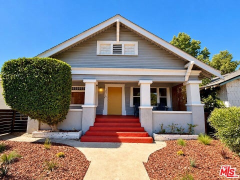 Photo of 3871 S Hobart Boulevard, Los Angeles, CA 90062 (MLS # 26998455)