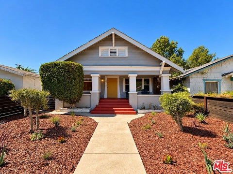 Photo of 3871 S Hobart Boulevard, Los Angeles, CA 90062 (MLS # 26998455)