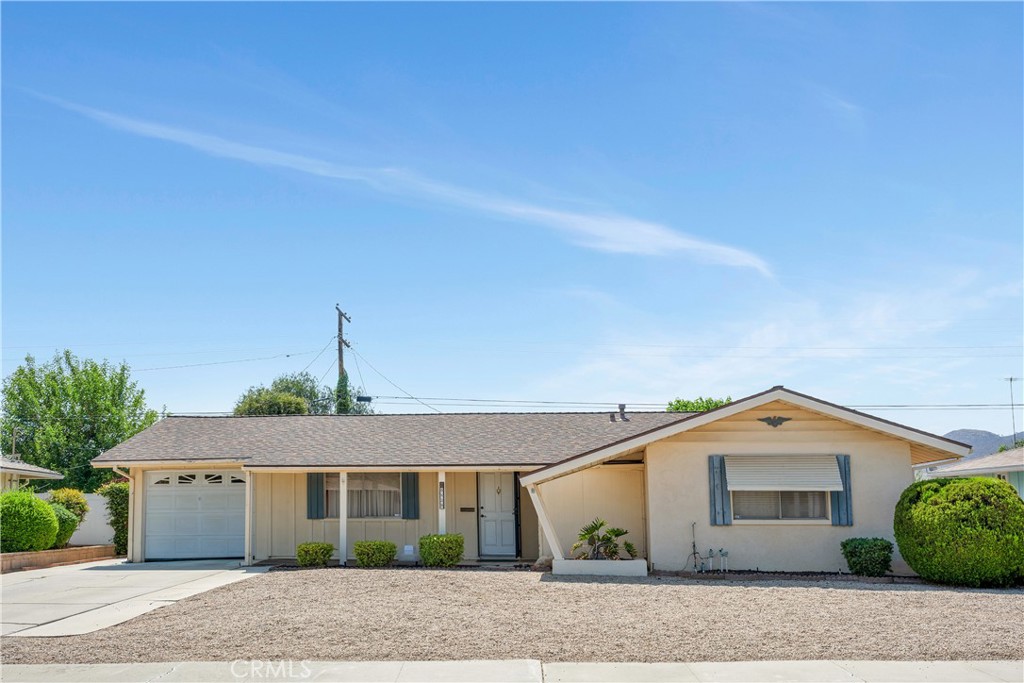 Quaint two bedroom, two bath home in the 55+ community of Sun City. This entry is into the living room. The master bedroom features an ensuite bathroom. There is an additional guest bath next to the guest room. The kitchen is located off of the living area. There is an unpermitted fully enclosed patio room that provides additional living space. The laundry room is off of the enclosed patio.
