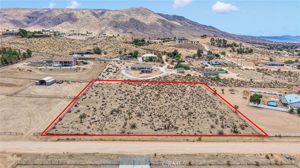 Horse Property with Stunning Views! Discover the perfect canvas for your dream home on this level 2.16-acre parcel in Apple Valley’s desirable Mariana Ranchos. Surrounded by breathtaking mountain and desert vistas, this versatile property is ideal for a custom residence, ADU, equestrian facilities, or a private ranch retreat. Enjoy the benefit of the area’s low-cost mutual water company, plus easy road access and nearby utilities. All this while being just minutes from Jess Ranch shopping, dining, and schools. Nestled in a peaceful rural neighborhood, this lot combines tranquility with excellent development potential. APN: 0438-062-06-0000
